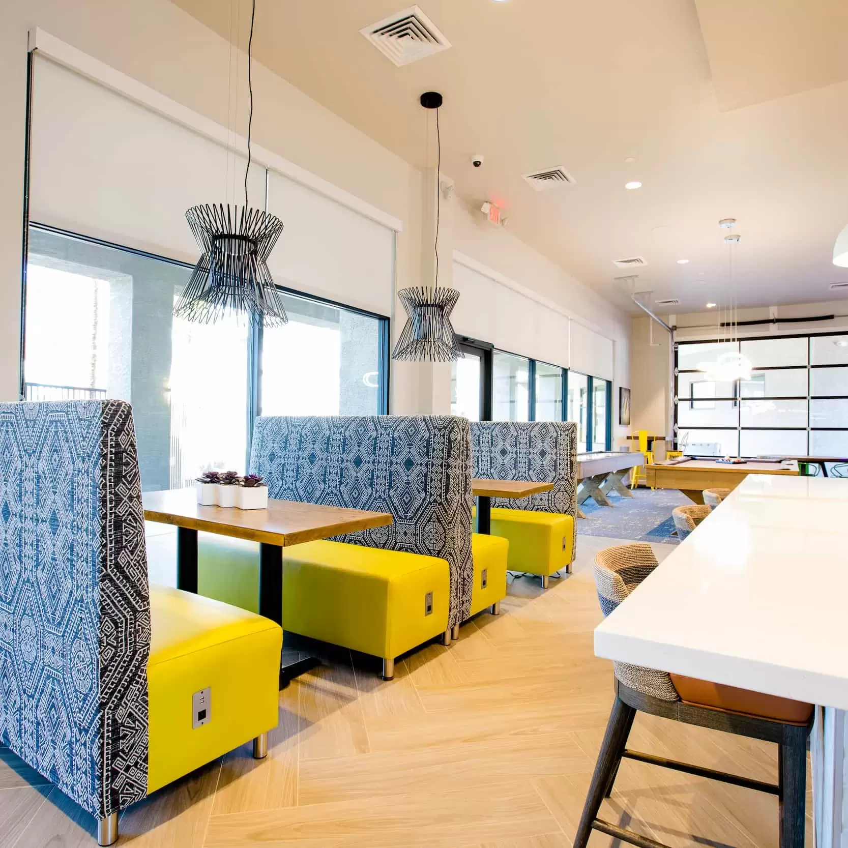 The Resident Hub, with plenty of comfortable seating for dining, socializing, or playing games.