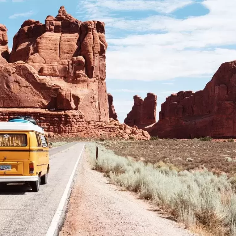 Van driving in the desert.